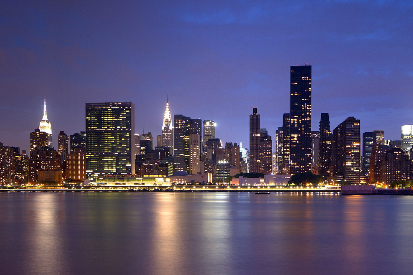 The Midtown Manhattan skyline at blue hour, seen across the East River